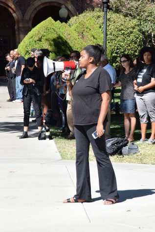 Egypt Howard speaks to the crowd during an awareness rally for Black Lives Matter. Photo credit: Royal T Lee-Castine