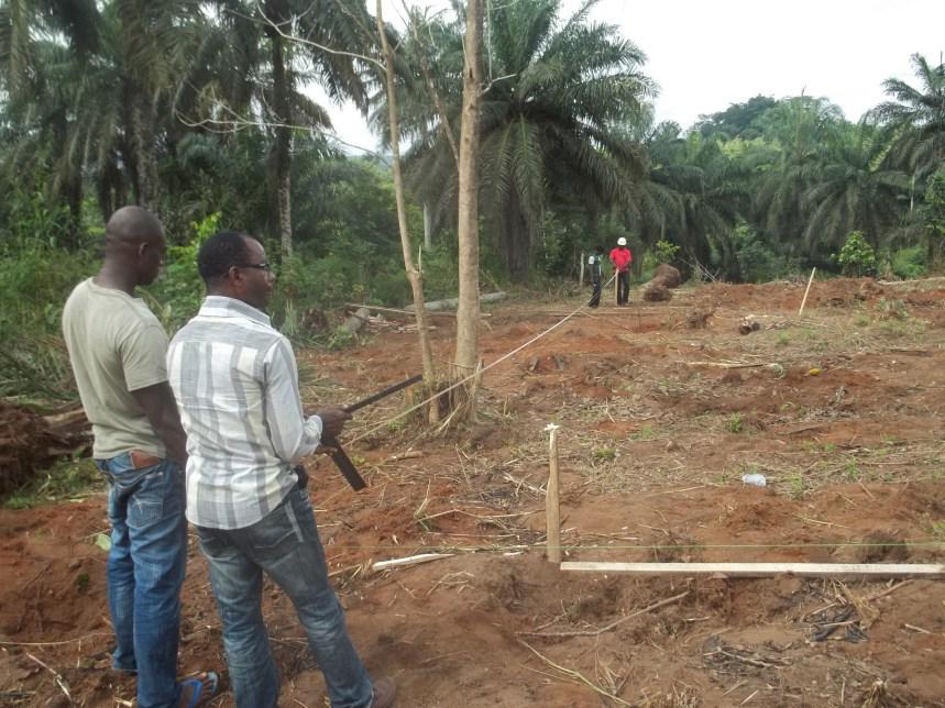 Photograph courtesy of James Umekwe
Workers measure the land during the early stages of constructon of Upon This Rock Medical Center last year. The Kristina Chesterman Memorial Clinic, which will be built in Umuahia, Nigeria, will be a sister clinic to the center.
