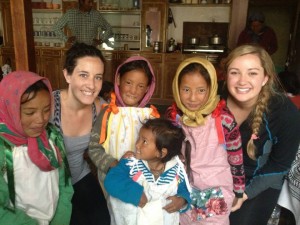 Photograph courtesy of Noelle Jahn Nursing majors Noelle Jahn and Faren Sanford smile with girls from the Spiti Valley in the Indian Himalayas.