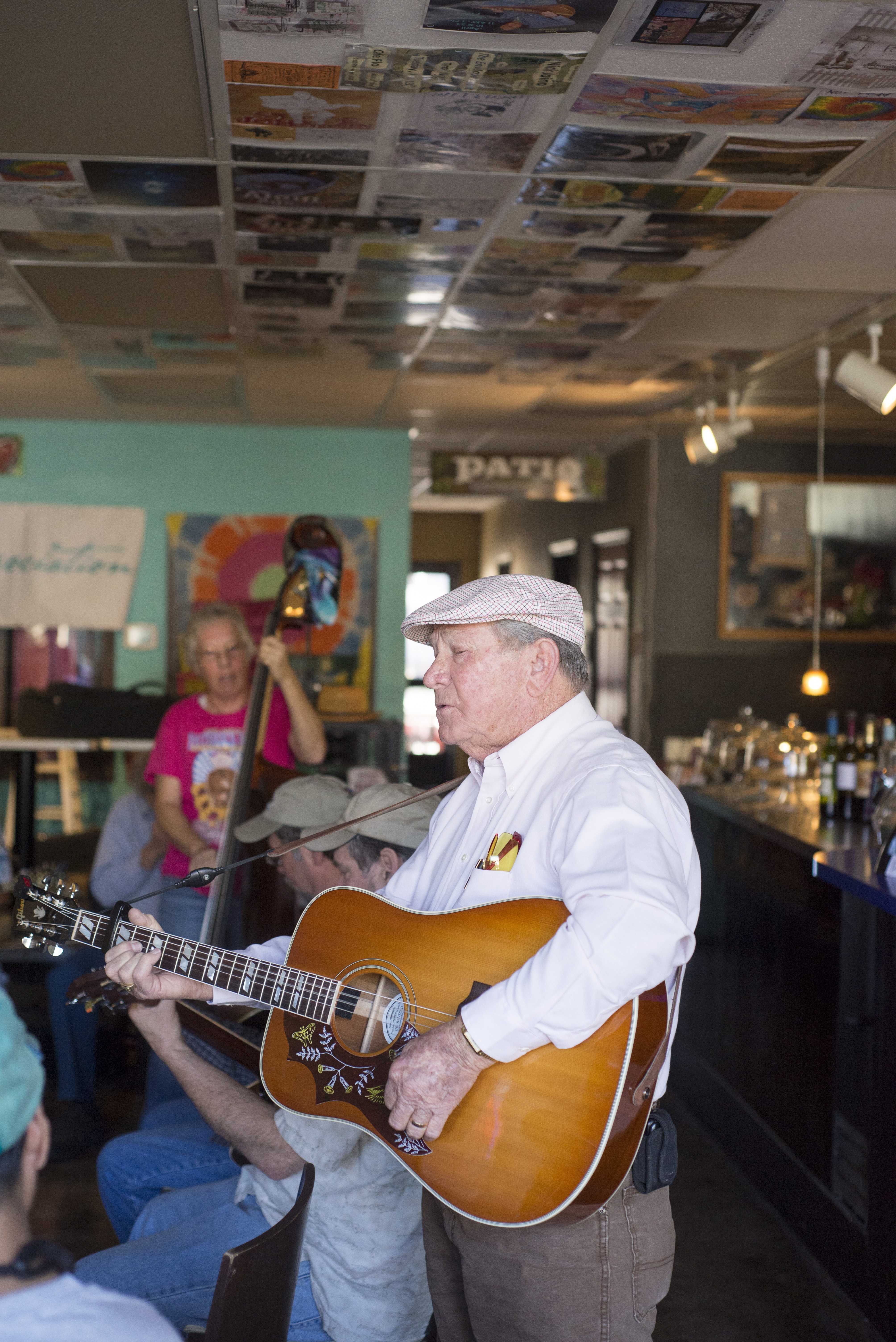 Eddy "Eddy B." Baker, of Eddy B. and Pure Country Plus, soulfully croons to audiences at Cafe Flo on Saturday.Photo credit: Matthew Vacca