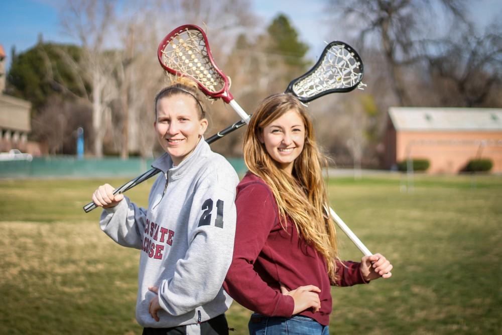 Rachael Crosby, 21, and Geneva Desin 20, proudly represent the Wildcats womens lacrosse team.Photo credit: Maisee Lee