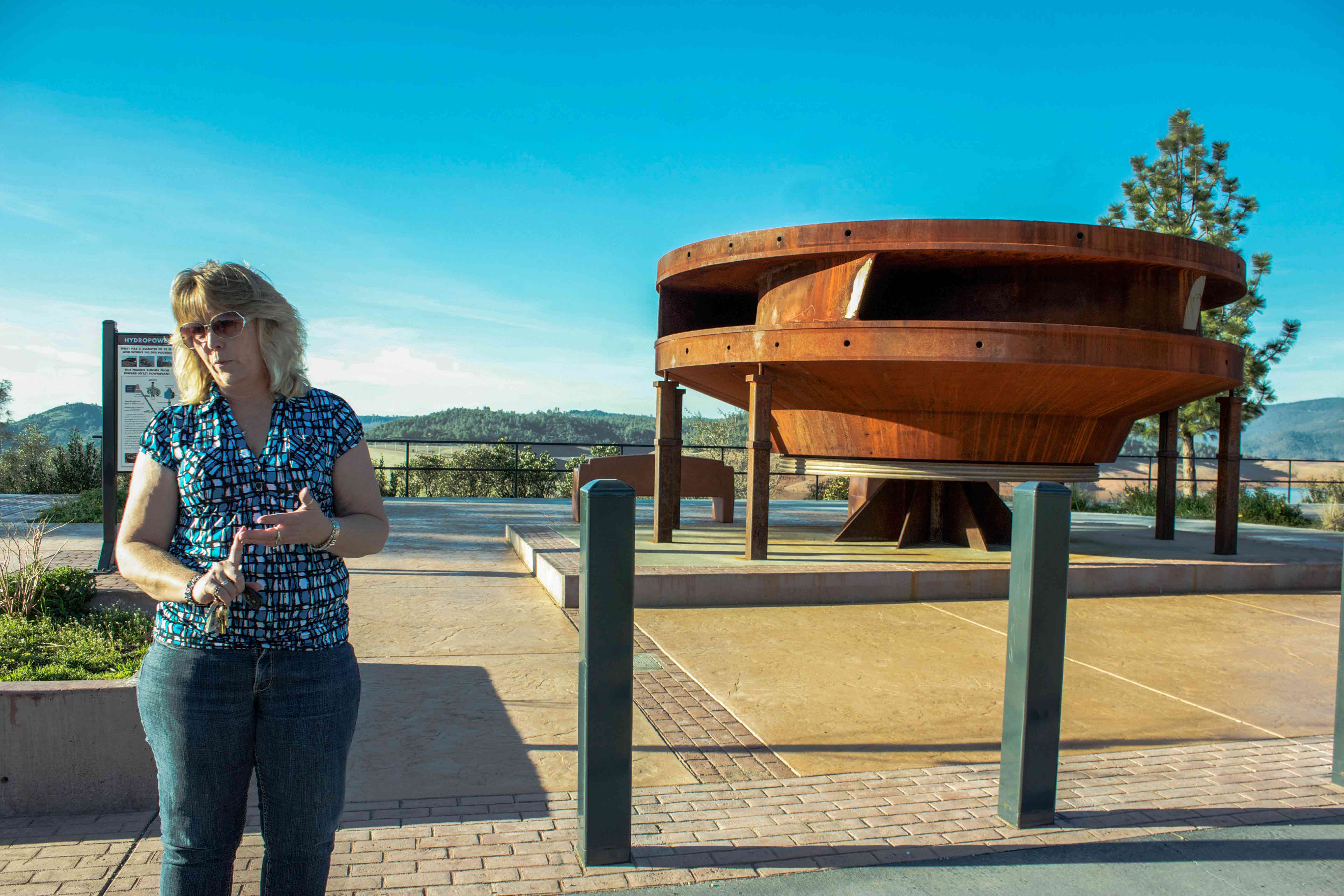 Jana Frazier, an Oroville Dam tour guide, explains how the hydroelectric turbines work.Photo credit: Chelsea Jeffers