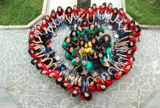 A camp for girls in Armenia led by the Peace Corps form a heart in 2012. Photo courtesy of the Peace Corps.