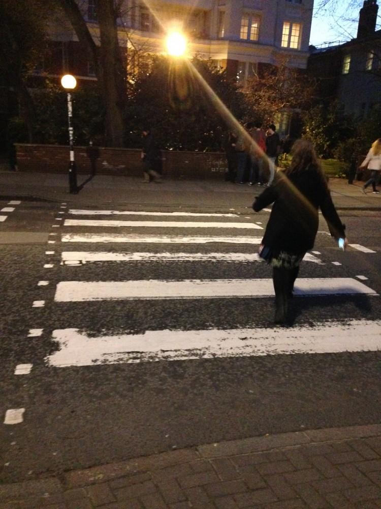 Michelle Manera walks the famous Abbey Road crossing. Courtesy of Michelle Manera.