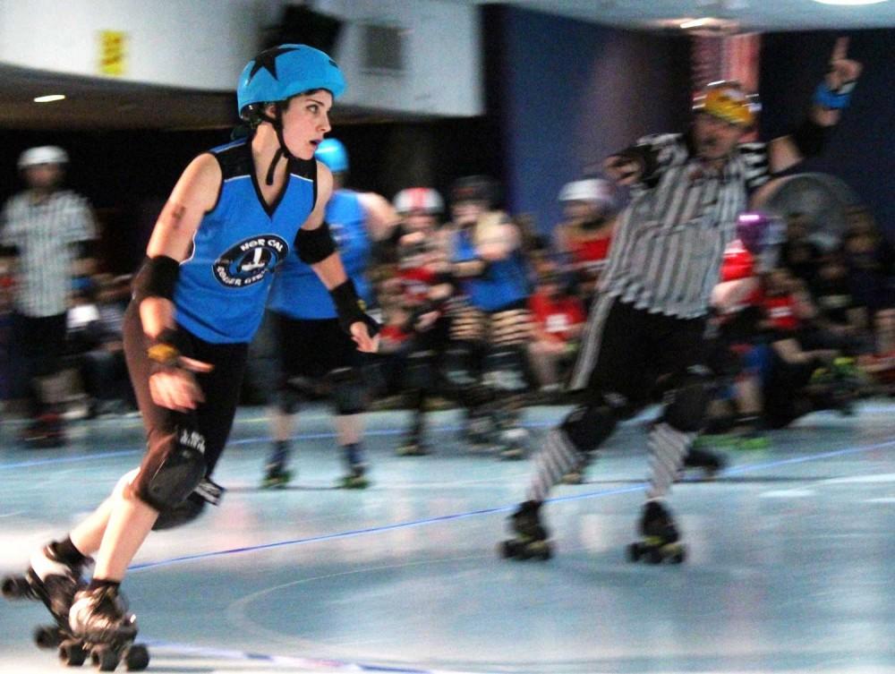 Sarena Kirk, a senior sociology and womens studies major, speeds around the rink for the Nor Cal Roller Girls. Photo credit: Quinn Western.