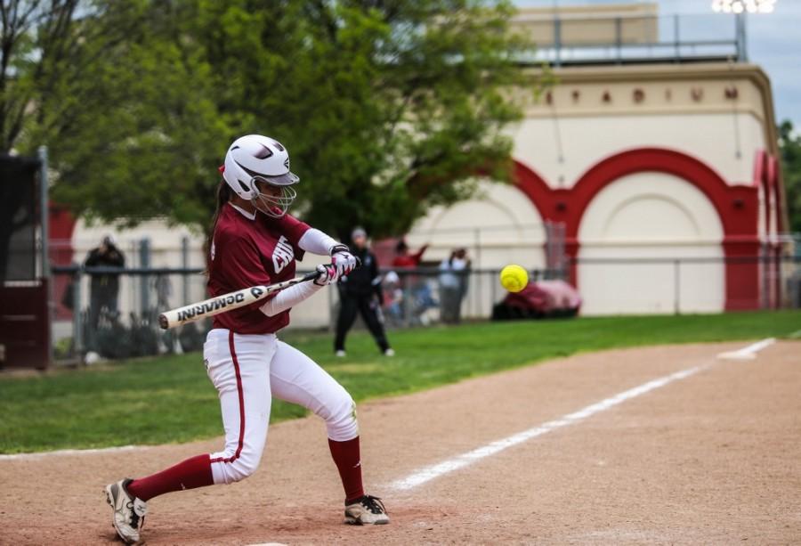 Sophomore Amanda Cordeiro swings for a hit earlier this season. Photo credit: Emily Teague