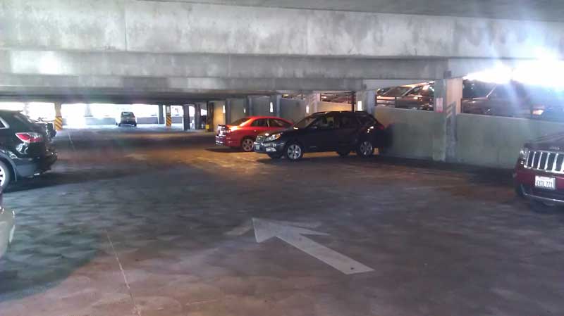 The south side of of the parking structure at 8:30 a.m. April 28 on Second and Ivy streets. In a two-week survey of vacant R-2 parking spaces, this area was consecutively empty. Photo credit: Enrique Raymundo