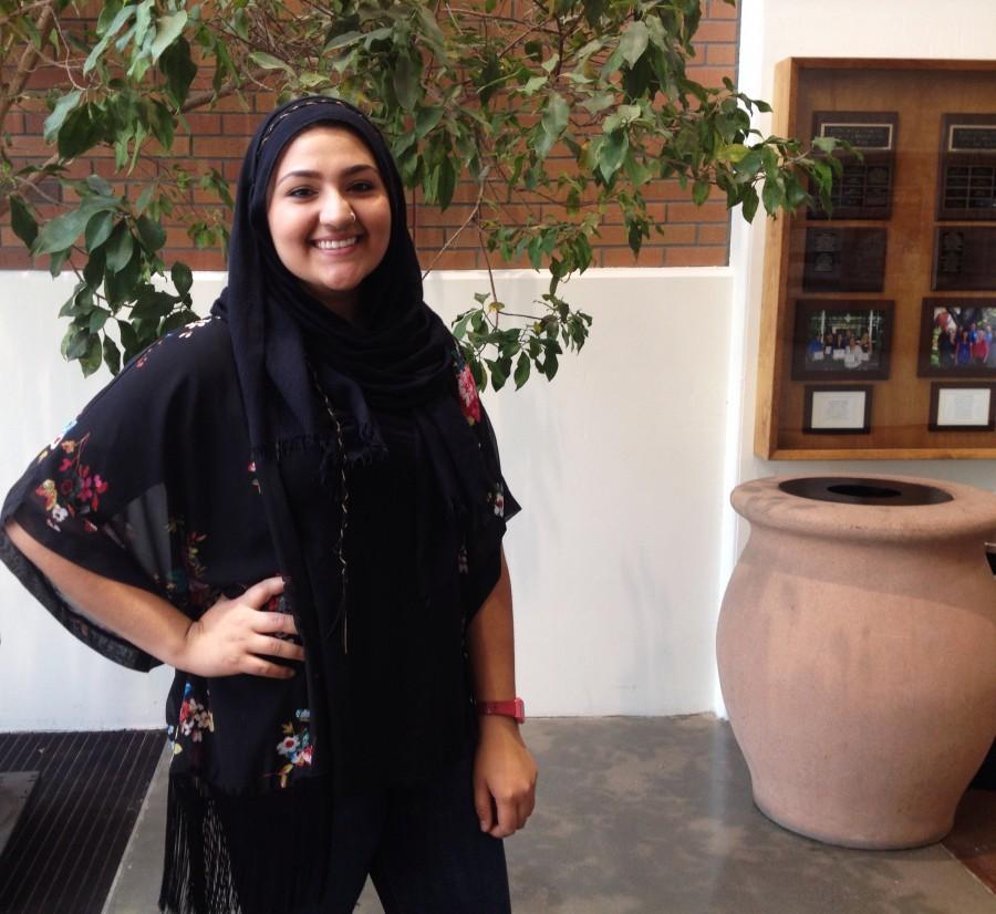 Aroosa Khan, junior criminal justice major, likes to mix contemporary fashion with her headscarf. Photo credit: Michaela Sundholm