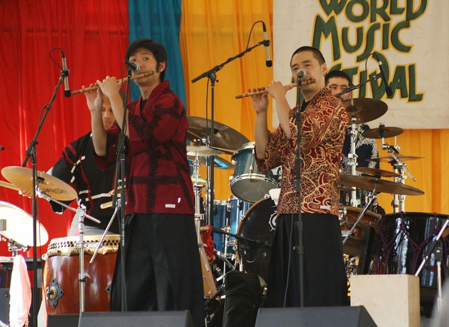 Shoji  Kameda, flute; Masato (Maz) Baba, flute; David Wells, taiko drum; Eien Hunter-Ishikawa' drum set play their second song at the Chico World Music Festival on Saturday, September 14, 2014.