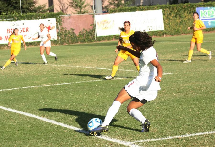 Pooja Patel in a difficult center attempt at Chico Stadium Friday October 24, 2014 against San Francisco State Gators.