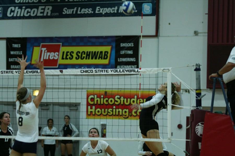 Chico State volleyball player Shannon Boling rises up to deliver a kill. Photo credit: John Domogma