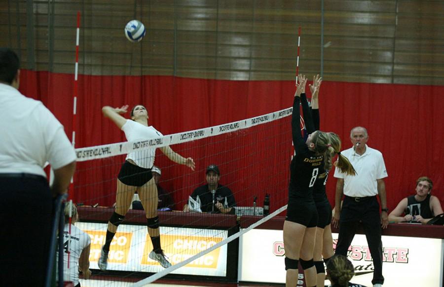 Shanon Boling of the Chico WIldcat Womens Volleyball team goes for the shot over Cal State Dominguez Hills defense Friday, October 3, 2014 Photo credit: John Domogma