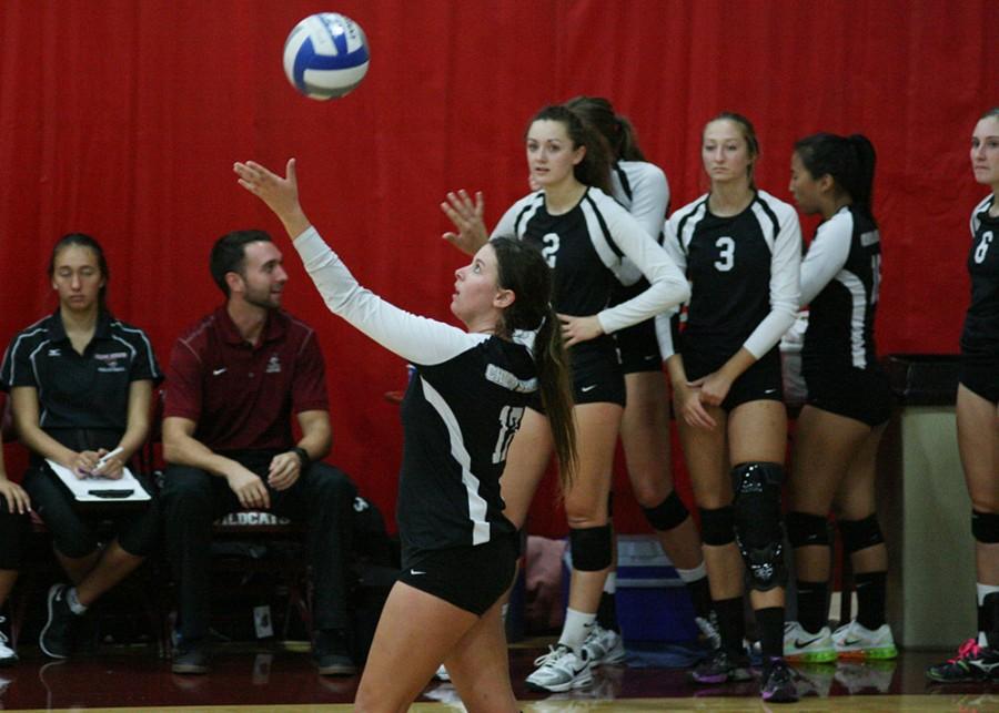 Sophomore Torey Tompson with the serve at Acker Gymnasium October 5, 2014. Photo credit: John Domogma