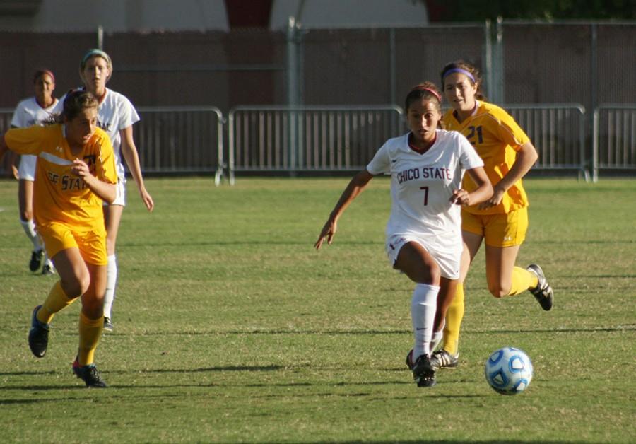 Senior Forward Stephanie Vaquerano of the Chico State Wildcats with a ball to the left side of the pitch on Friday October 24, 2014.