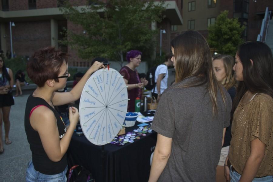 Emilee Hunt, an intern at the GSEC, educates participants on different gender and sexuality terms.