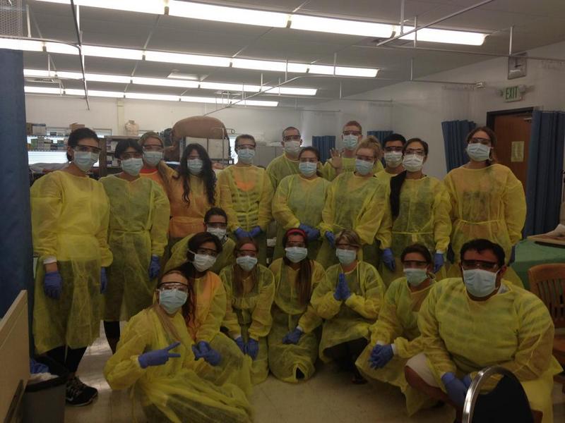 The nursing students receive hands-on experience by working in a lab for isolation practice in addition to giving flu shots. Photo courtesy of Cambria Diehl