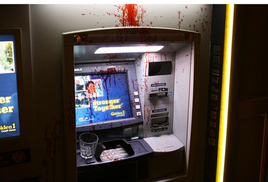The Golden 1  ATM on 2nd St.in Chico is covered with an unknown persons blood Halloween 2014. Photo by John Domogma. 