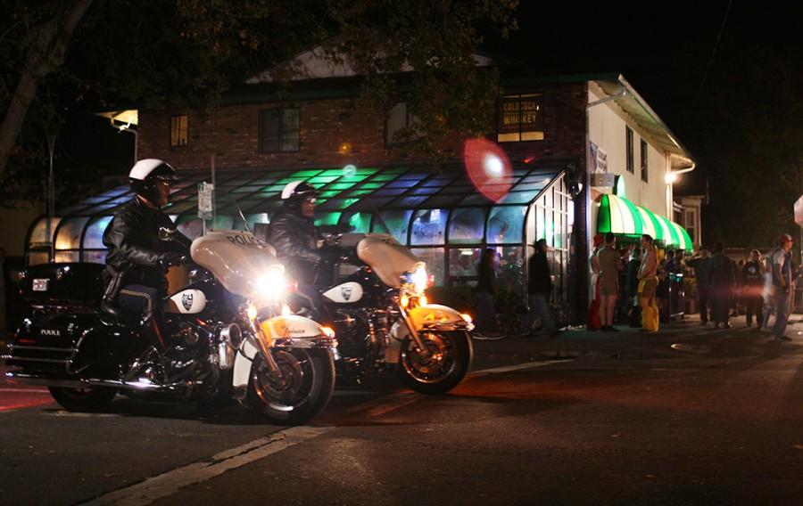 Two police motorcycle units patrol West Fifth and Ivy streets, Nov. 1.