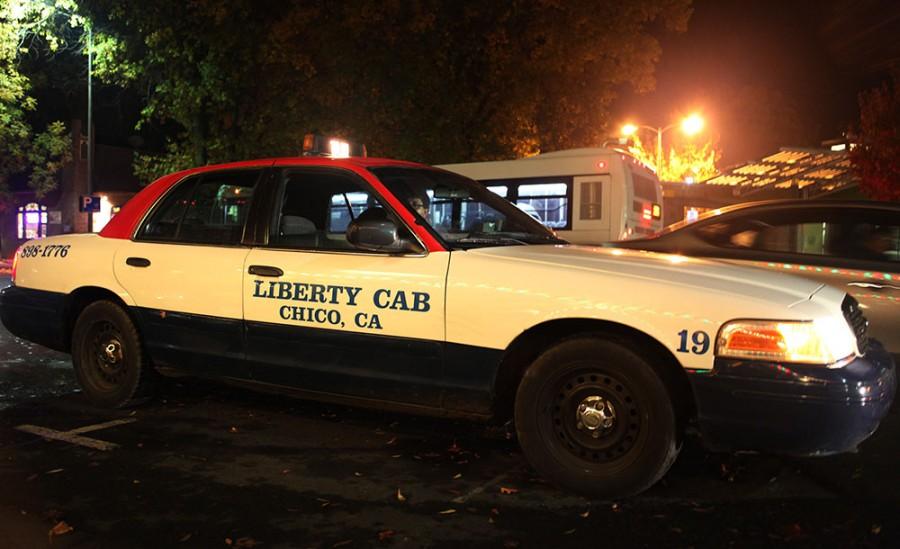 Hossam Brahem of Chico Liberty Cab picks up a customer Nov. 22 on West Second and Ivy streets. Photo credit: John Domogma