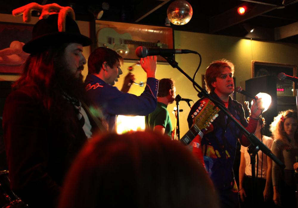 The Yule Logs, a local holiday-themed rock 'n' roll band, entertained Chico locals at Duffy's Tavern Friday with its use of holiday-themed props. Photo credit: John Domogma