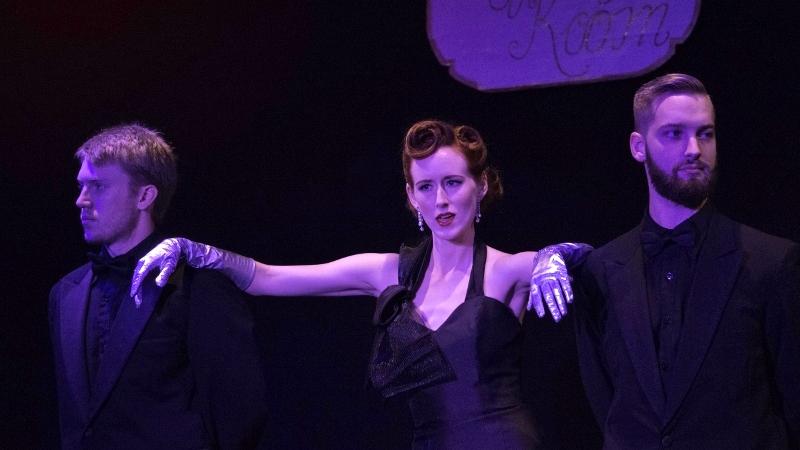 Betty Haynes (Elisabeth Schirmers) performs Love, You Didnt Do Right By Me with dancers Tristan Gunderson, left, and Sean Rush, right, for her first solo act in New York during Chico Theater Companys White Christmas. Photo credit: Brandon Foster
