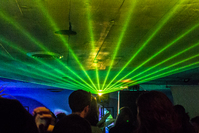Lights shine over a dance floor.