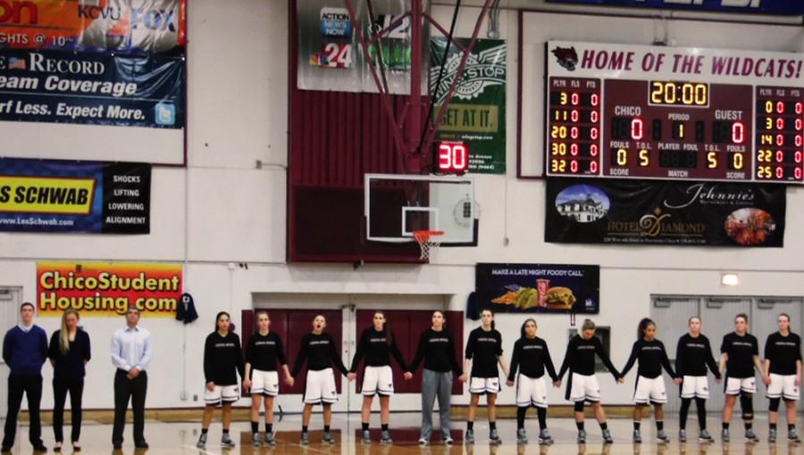 Chico State womens basketball team lining up for the national anthem. Photo credit: George Johnston