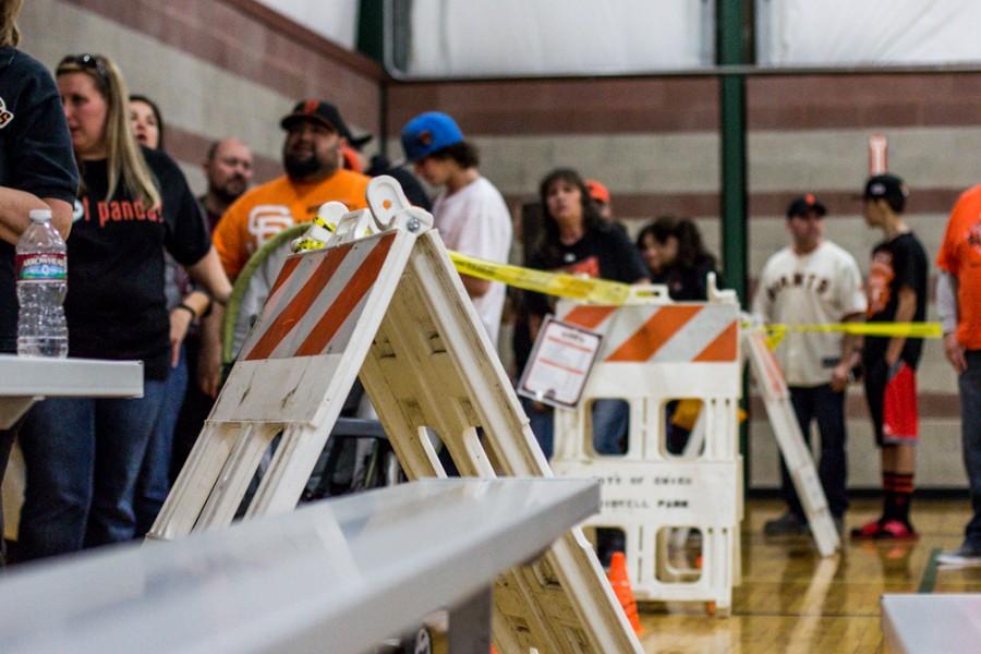 Hundreds of Butte County residents line up to get pictures with the SF Giant's World Series trophies. The 3 trophies were on display on Saturday, Jan. 31, 2015 in the gym of the Arron Ray Clark Memorial Field House. Photo credit: Trevor Ryan