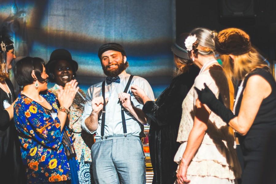 Chico State student Nicholas Monroe shows off his suspenders in the costume contest during the party. Photo credit Trevor Yale Ryan