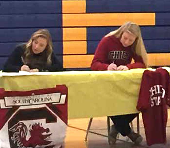 Sammy DeHart, right, signs her National Letter of Intent to attend Chico State in the fall. DeHart started for two years on Nevada Union High Schools varsity team in Grass Valley and was one of two team captains. Photo courtesy of Rory Miller.