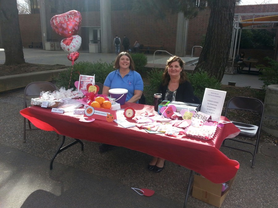 Pam Morrell and Lori Adrian are on table duty selling valentines and desserts to raise money for Relay For Life Photo credit: Brittany Mcclintock