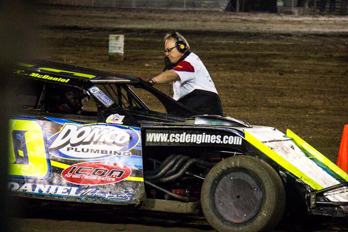Lots of contact, cars off track and conversations with officials is common when youre competing on dirt. Photo by Trevor Ryan
