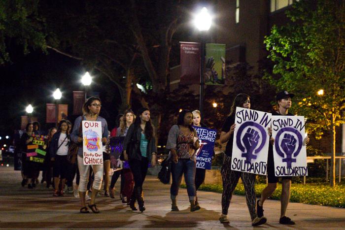 Everyone silently continues to the Chico State Free Speech Area.