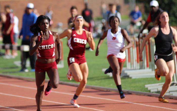 Chico States senior Ashely Jones finishes in first place in the 100 meter dash finals Saturday at the Twilight and Distance Carnival held at Chico State. closely behind her is junior Aja Erskine. Photo credit: Malik Payton
