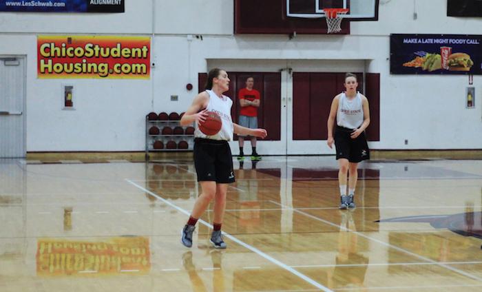 Wildcat Brooke Bowen, left, practices at Acker Gym in preparation for an upcoming game. Bowen said that excessive alcohol intake can be a big barrier for students trying to stay in shape. Photo credit: Caio Calado