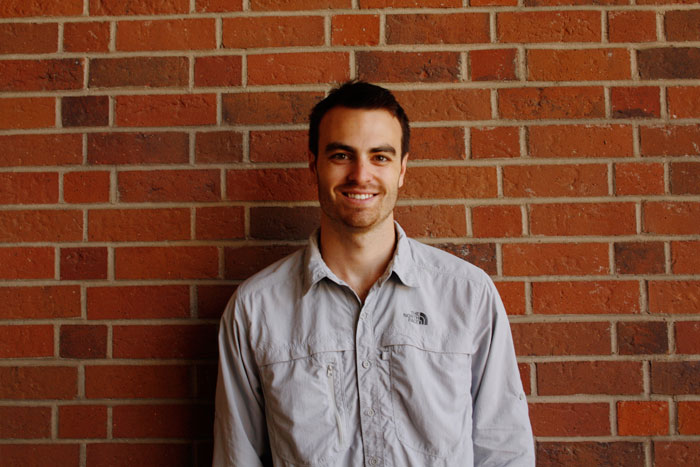 Chase Palmieri, a senior entrepreneurship and small business management major, plans to change the way people donate through a simple app he created called SlideSocial. Photo credit: Nicole Santos