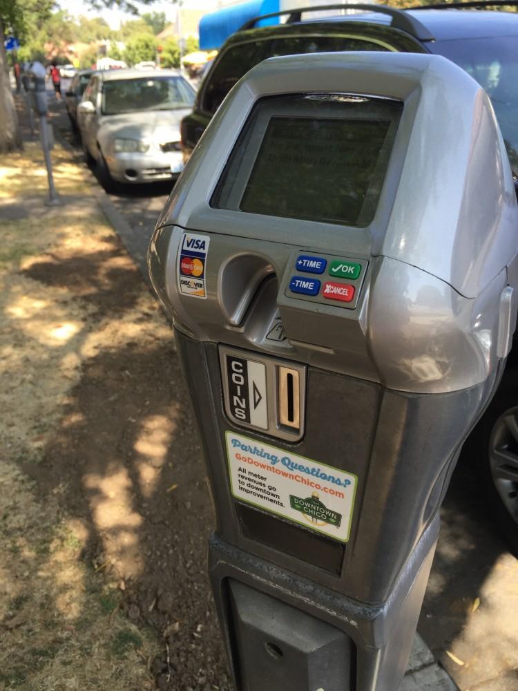 New parking meters installed on campus will no longer accept change as an acceptable form of payment. The updated meters will now only accept Visa or MasterCard in an effort to be more sustainable. Photo credit: Carly Plemons