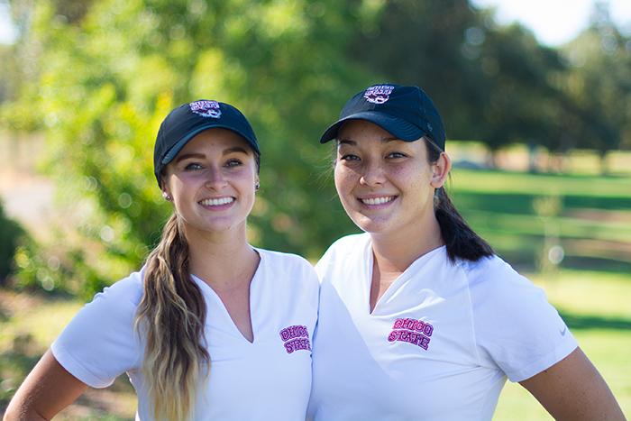 Dani OKeefe and Bianca Armanini, seniors, get ready to play through the Skyway Golf Park course on Saturday. Photo credit: Alicia Brogden