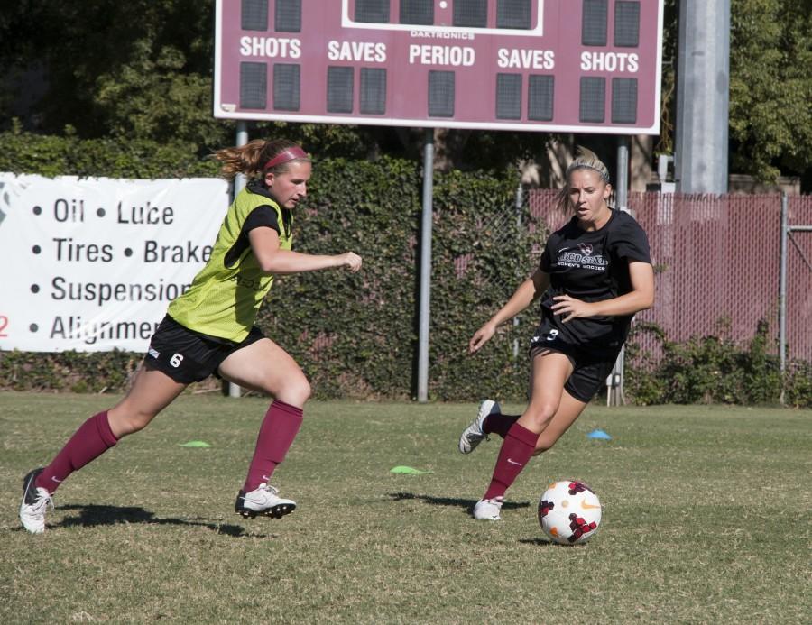 Shelby Lanksbury (left), junior forward, says having families on the womens soccer team is a fun way to make lasting connections. Photo credit: Jenelle Kapellas
