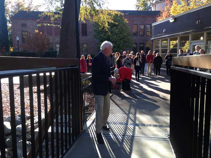 Paul Zingg, president of Chico State, was the first person to test out the newly constructed Gus Magnolis bridge. Photo credit: George Johnston