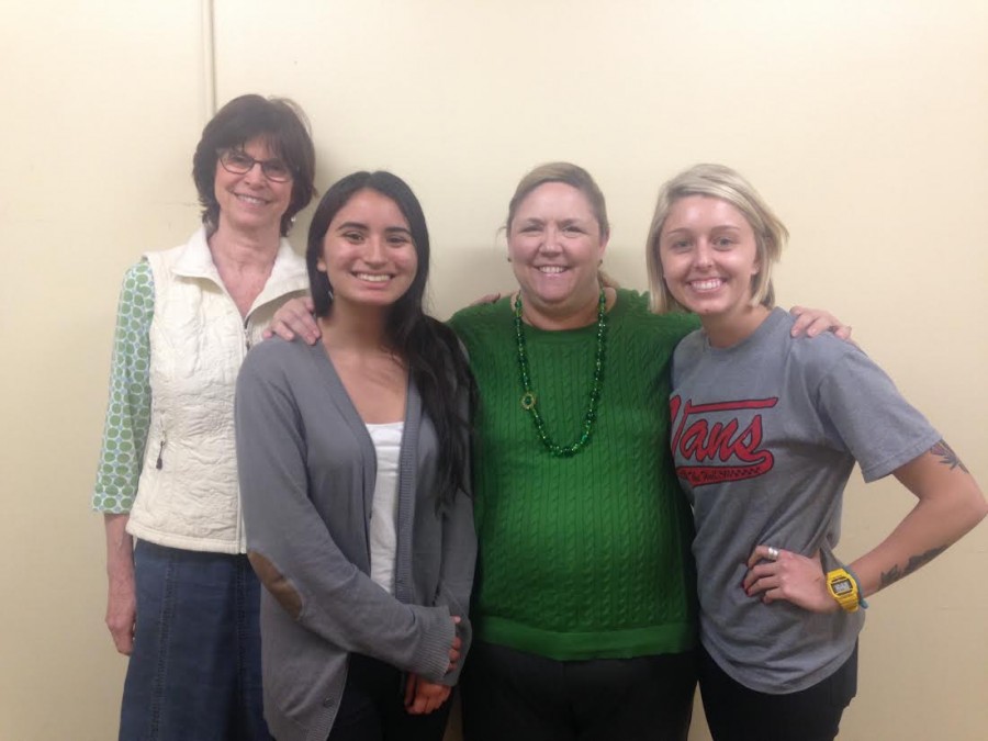 Ann, Brina, Trisha and Taylor are all smiles as they await the first day of the Mindfulness Based Stress Reduction course. Photo credit: Dominique Diaz