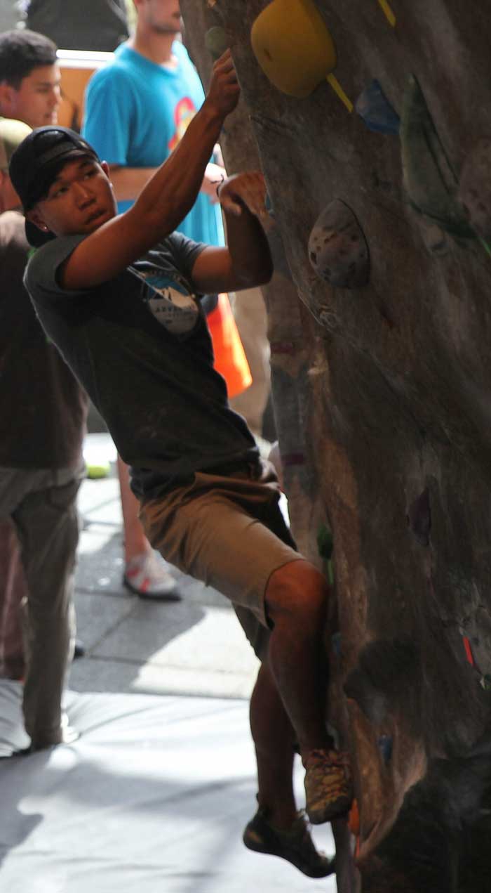 Climber Chris SooHoo makes his way up the wall at The Ruckus. 