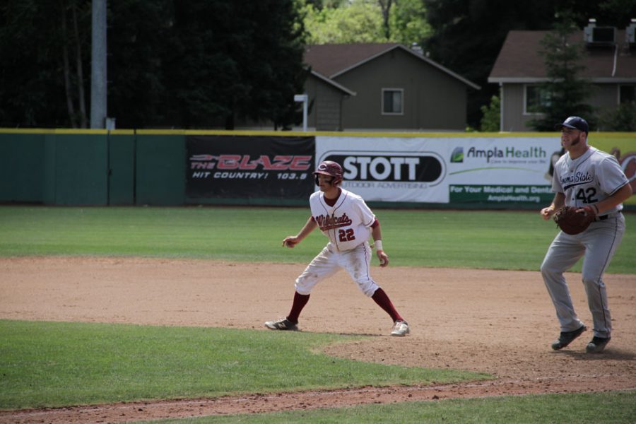 Junior Casey Bennett takes his lead from first during a game against Sonoma State. Photo credit: Jacob Auby