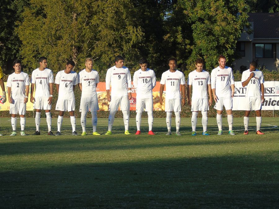 The mens soccer team lines up before their game Photo credit: Royal T Lee-Castine