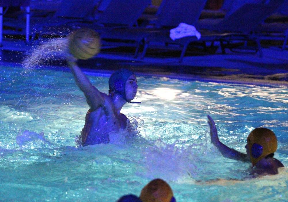 Chico State men's water polo attempts to score. Orion Stock Photo