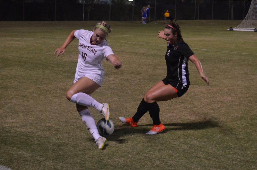 Chico State's Brianna Tovani battles for control of the ball Photo credit: Jordan Jarrell