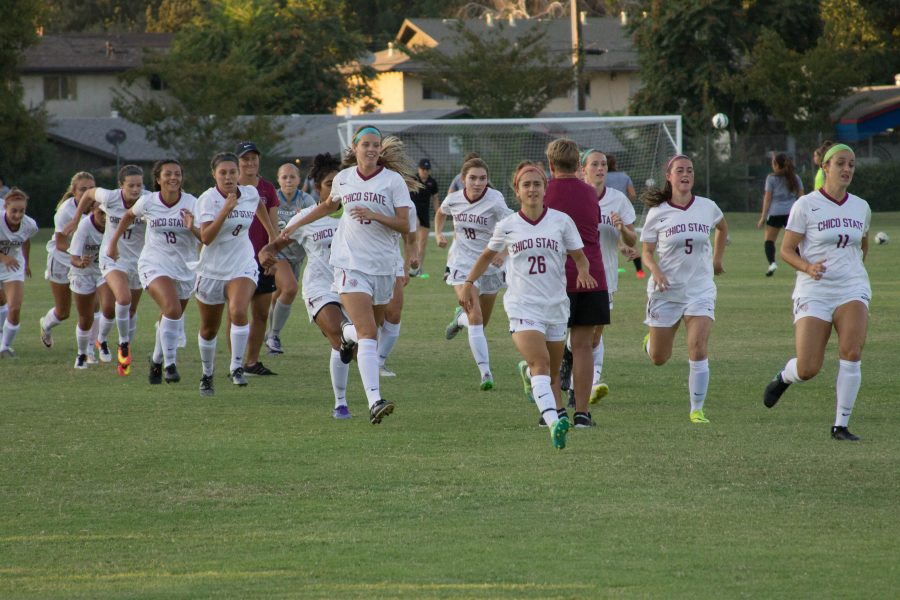 Chico State womens soccer charges onto the field during their first home game of the season. Photo credit: Aubrie Coley
