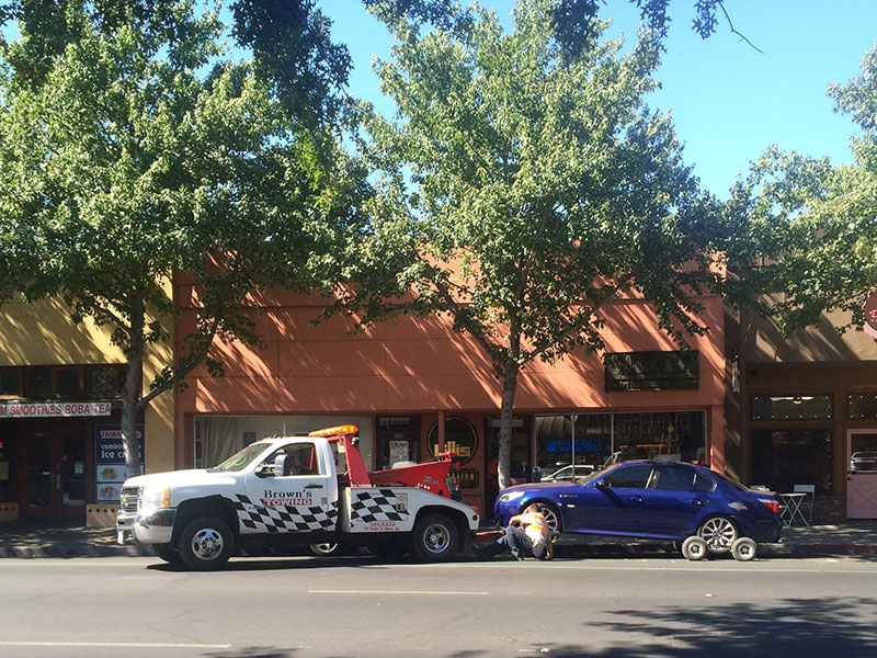Owners car gets towed at the Dungeon smoke shop. Photo credit: Lexi Hoedt