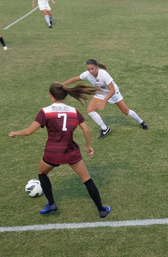 Chico State sophomore defender Korie Bozart dribbles the ball away from an opponent during the Cats home game. Photo credit: Jordan Jarrell