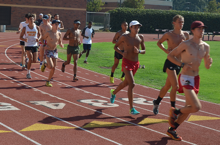 The Chico State mens cross country team practices on their home track before an invitational. Photo credit: Jordan Jarrell